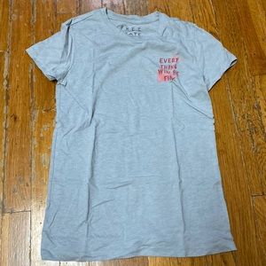 Gray tee with “everything will be fine”